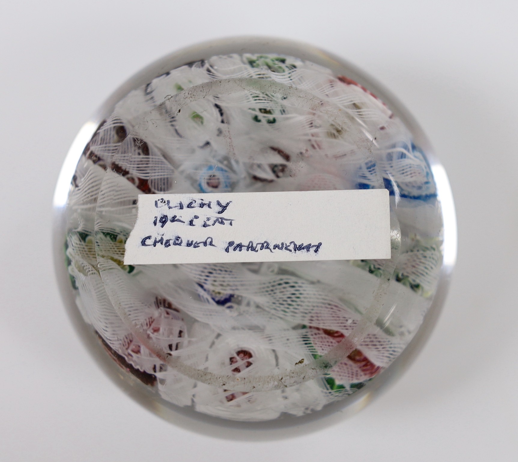 A Clichy glass paperweight with Clichy rose